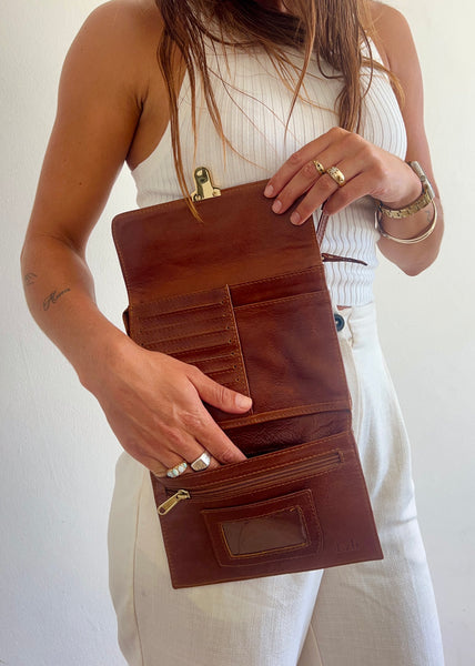 Brown utility bag with gold trims