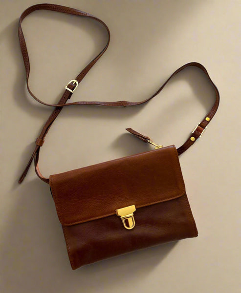 Brown utility bag with gold trims