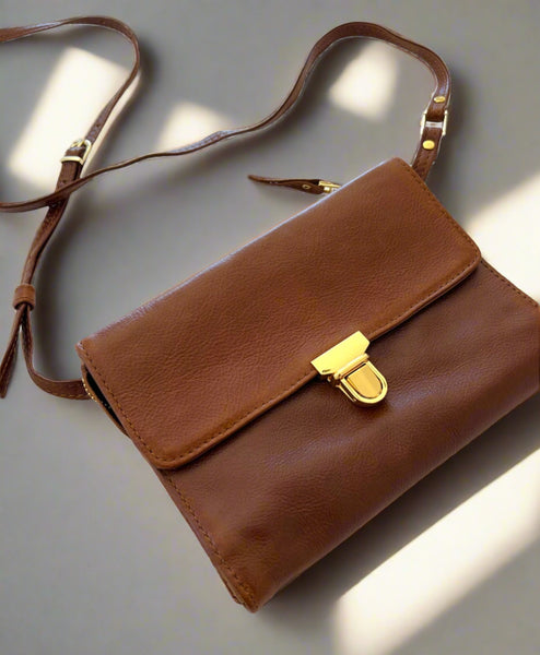 Brown utility bag with gold trims